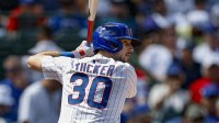 Chicago Cubs right fielder Kyle Tucker (30) bats against the Milwaukee Brewers during the first inning at Wrigley Field.