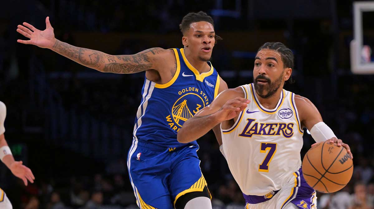 Golden State Warriors guard Will Richard (3) defends Los Angeles Lakers guard Gabe Vincent (7) during the first half at Crypto.com Arena.