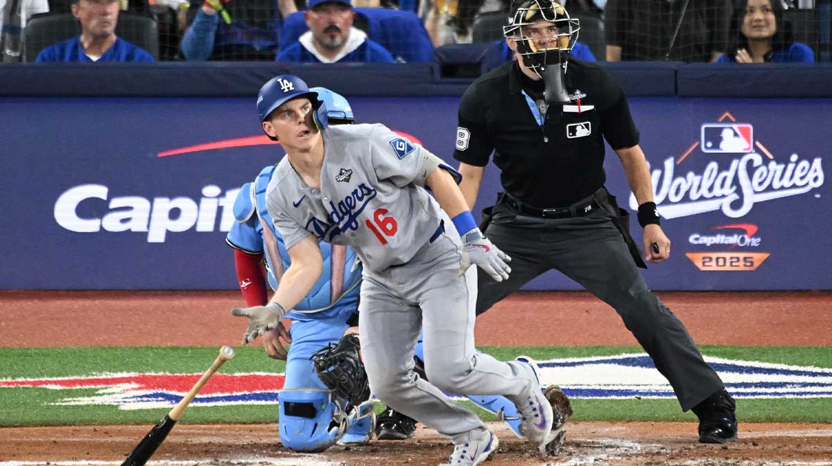 Los Angeles Dodgers catcher Will Smith (16) hits an RBI double against the Toronto Blue Jays in the third inning during game six of the 2025 MLB World Series at Rogers Centre
