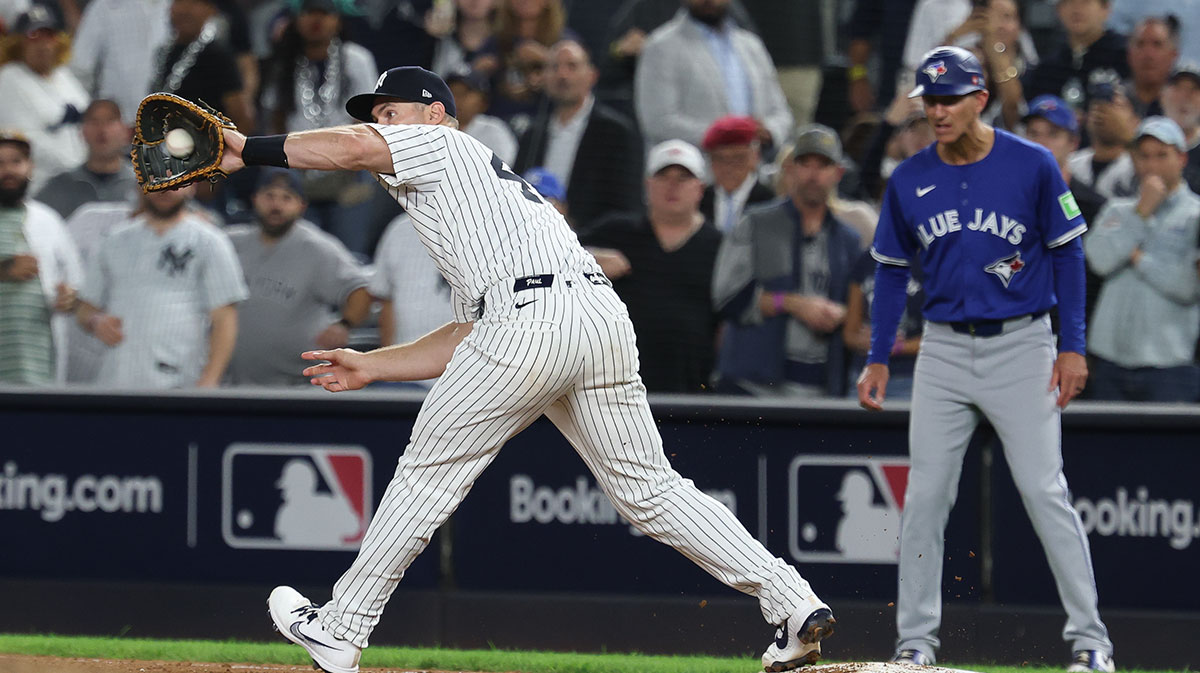 New York Yankees first baseman Paul Goldschmidt (48) catches the ball forcing out Toronto Blue Jays first baseman Vladimir Guerrero Jr. (not pictured) during the ninth inning of game three of the ALDS round of the 2025 MLB playoffs at Yankee Stadium.