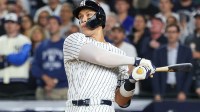 New York Yankees outfielder Aaron Judge (99) hits a three-run home run in the fourth inning against the Toronto Blue Jays during game three of the ALDS round for the 2025 MLB playoffs at Yankee Stadium.