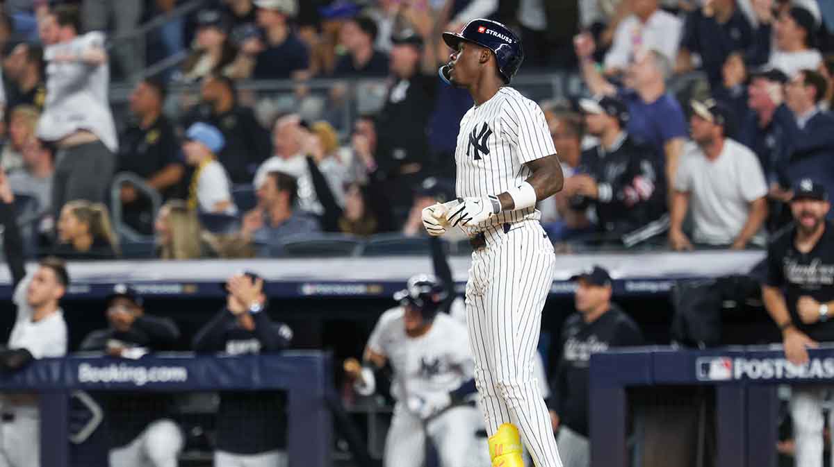 New York Yankees second baseman Jazz Chisholm Jr. (13) reacts after hitting a solo home run in the fifth inning against the Toronto Blue Jays during game three of the ALDS round for the 2025 MLB playoffs at Yankee Stadium.