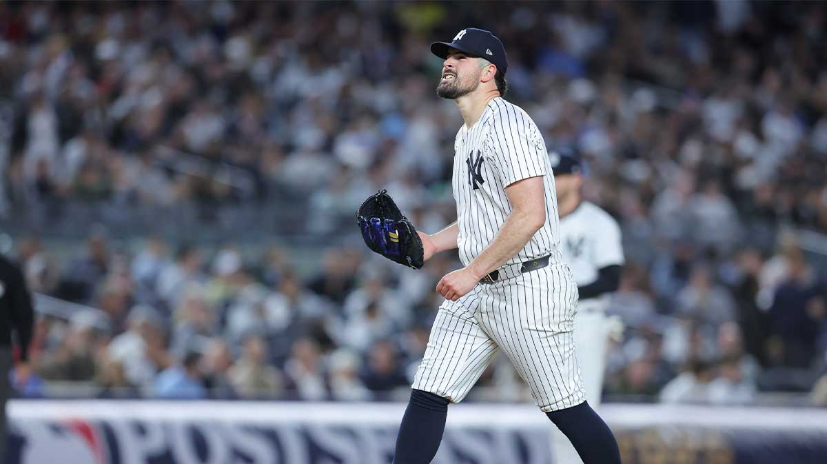 New York Yankees starting pitcher Carlos Rodon (55) reacts after walking a batter during the seventh inning against the Boston Red Sox during game two of the Wildcard round for the 2025 MLB playoffs at Yankee Stadium.
