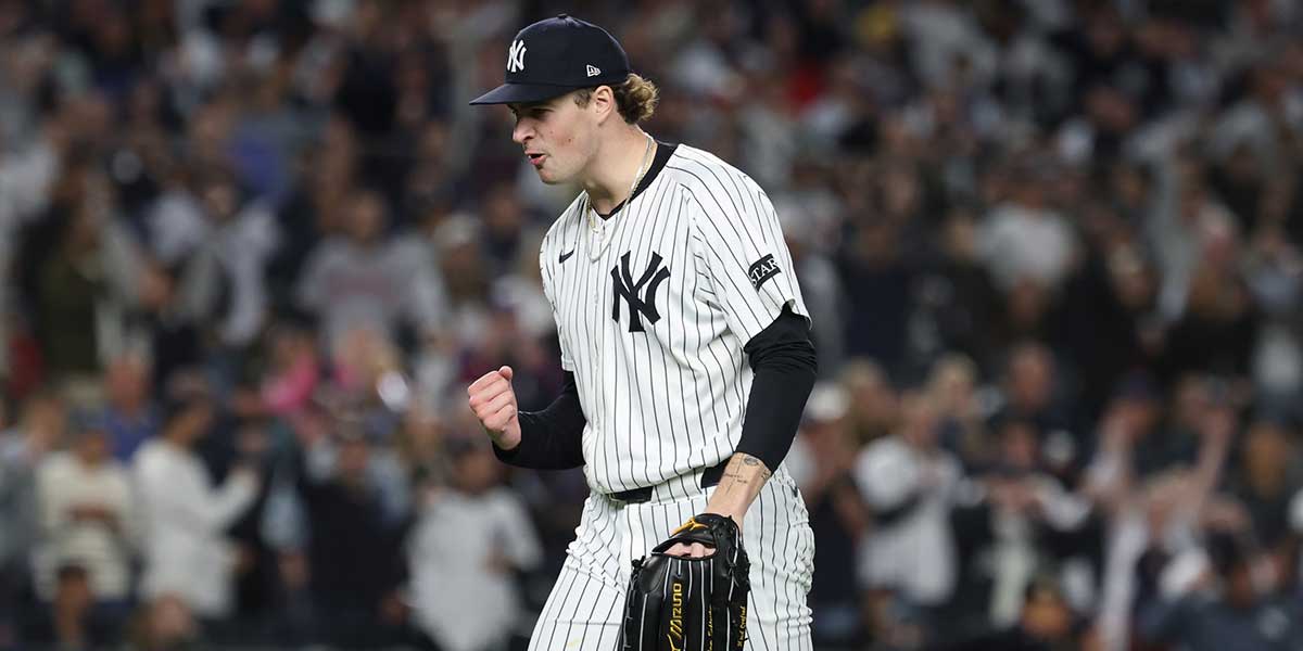 ; New York Yankees pitcher Cam Schlittler (31) pumps his fist as he leaves the field after pitching the eighth inning against the Boston Red Sox during game three of the Wildcard round for the 2025 MLB playoffs at Yankee Stadium.