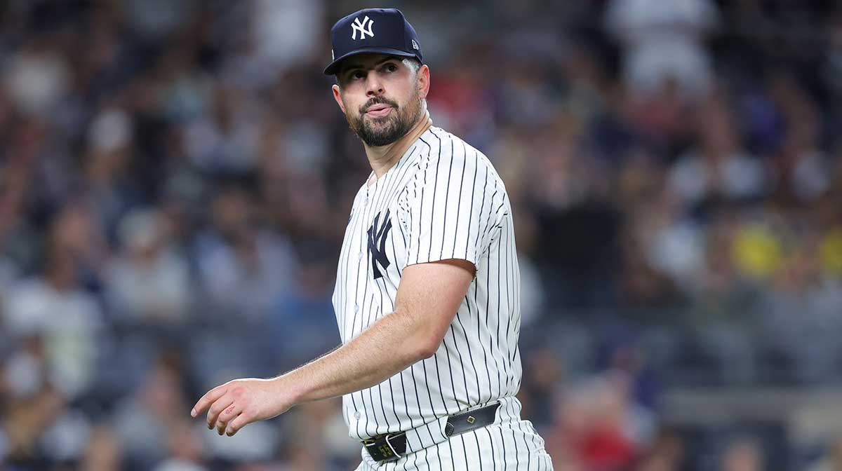New York Yankees starting pitcher Carlos Rodon (55) looks on after leaving the game during the seventh inning against the Boston Red Sox during game two of the Wildcard round for the 2025 MLB playoffs at Yankee Stadium. 