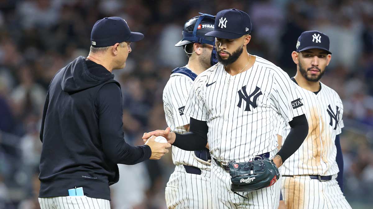 Yankees relief pitcher Devin Williams (38) is relieved