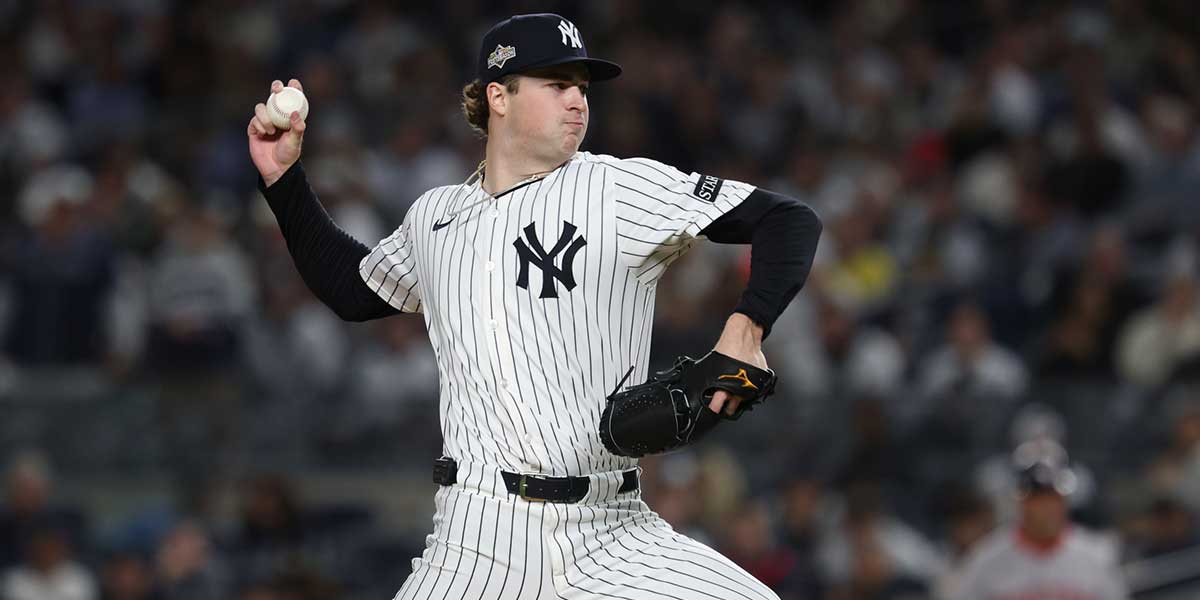 New York Yankees starting pitcher Cam Schlittler (31) throws to the plate in the third inning against the Boston Red Sox during game three of the Wildcard round for the 2025 MLB playoffs at Yankee Stadium.