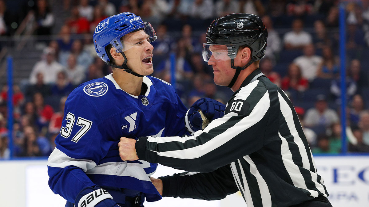 linesman Jonathan Deschamps (80) holds back Tampa Bay Lightning center Yanni Gourde (37) against the Florida Panthers in the first period at Benchmark International Arena.