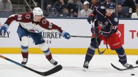 Columbus Blue Jackets right wing Yegor Chinakhov (59) passes the puck as Colorado Avalanche center Martin Necas (88) defends during the third period at Nationwide Arena.