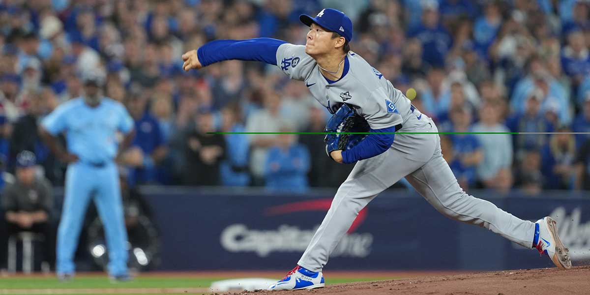 Los Angeles Dodgers pitcher Yoshinobu Yamamoto (18) throws pitch against the Toronto Blue Jays in the first inning for game six of the 2025 MLB World Series at Rogers Centre.