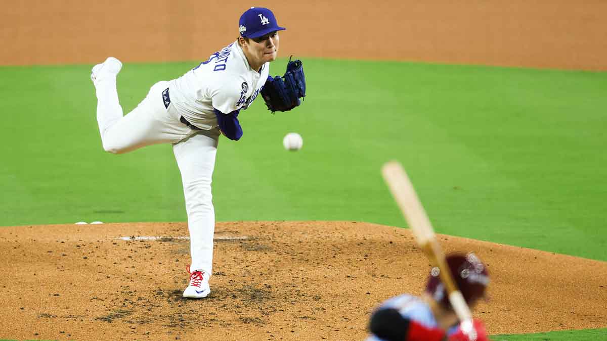 Los Angeles Dodgers pitcher Yoshinobu Yamamoto (18) pitches during the second inning against the Philadelphia Phillies during game three of the NLDS round for the 2025 MLB playoffs at Dodger Stadium.