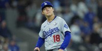 Los Angeles Dodgers pitcher Yoshinobu Yamamoto (18) reacts in the fifth inning against the Toronto Blue Jays during game six of the 2025 MLB World Series at Rogers Centre.