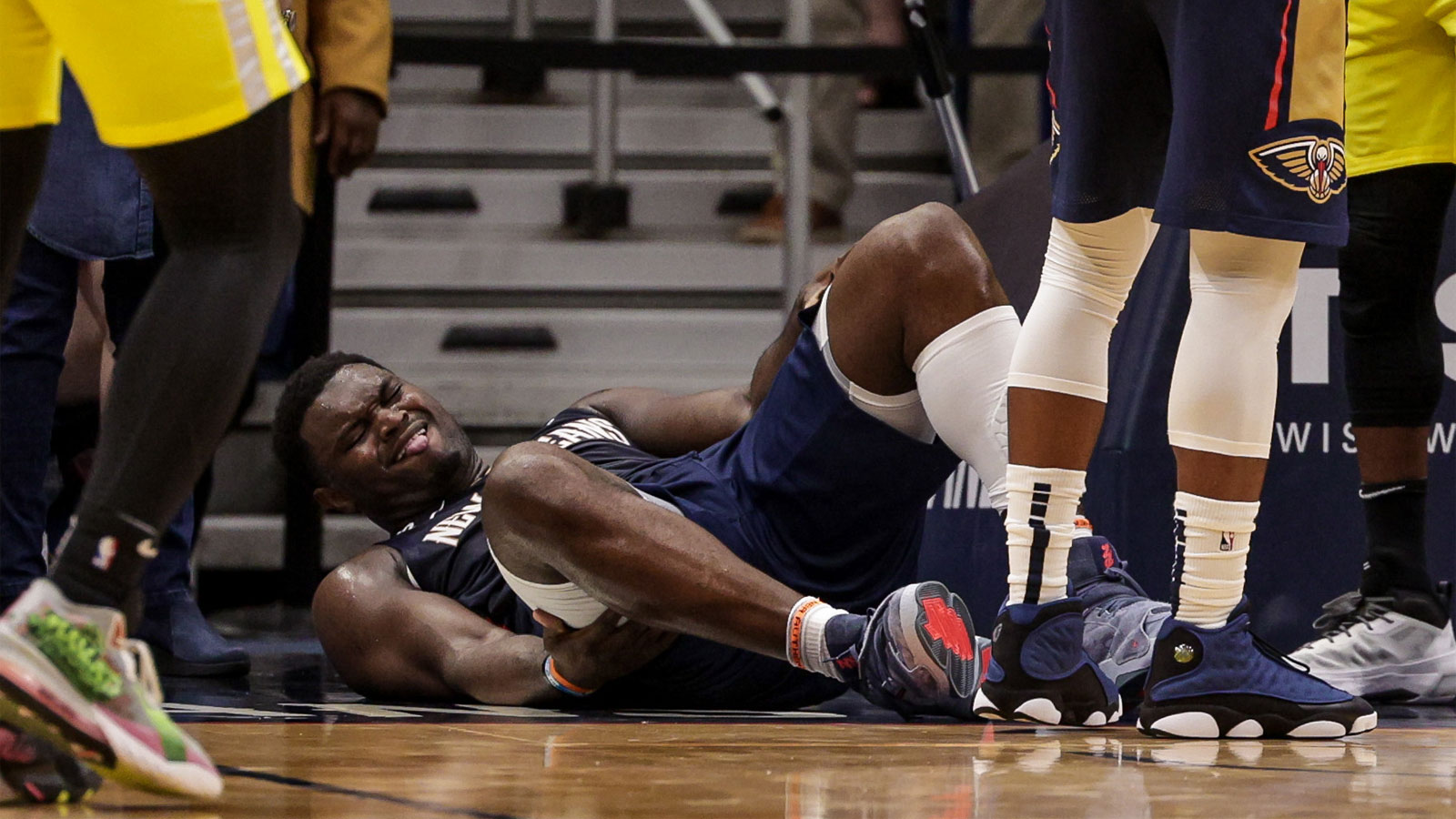 New Orleans Pelicans forward Zion Williamson (1) is injured on a play by a Utah Jazz player during the second half at Smoothie King Center. 