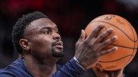 New Orleans Pelicans forward Zion Williamson (1) warms up before the start of the game against the Atlanta Hawks at State Farm Arena.