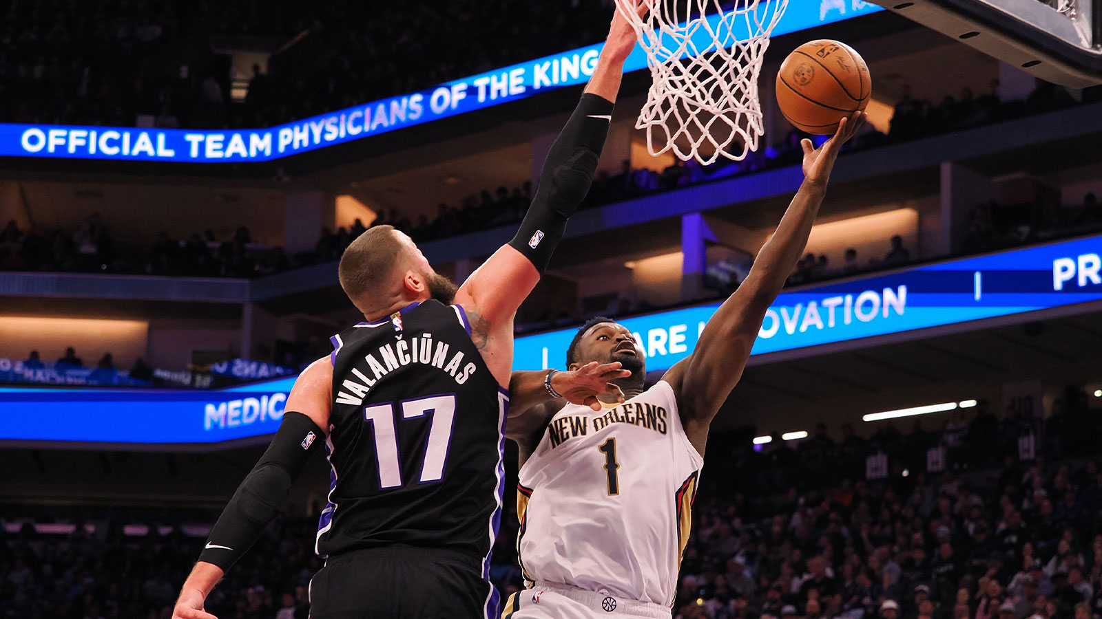 New Orleans Pelicans forward Zion Williamson (1) shoots the ball against Sacramento Kings center Jonas Valaciunas (17) during the third quarter at Golden 1 Center. 
