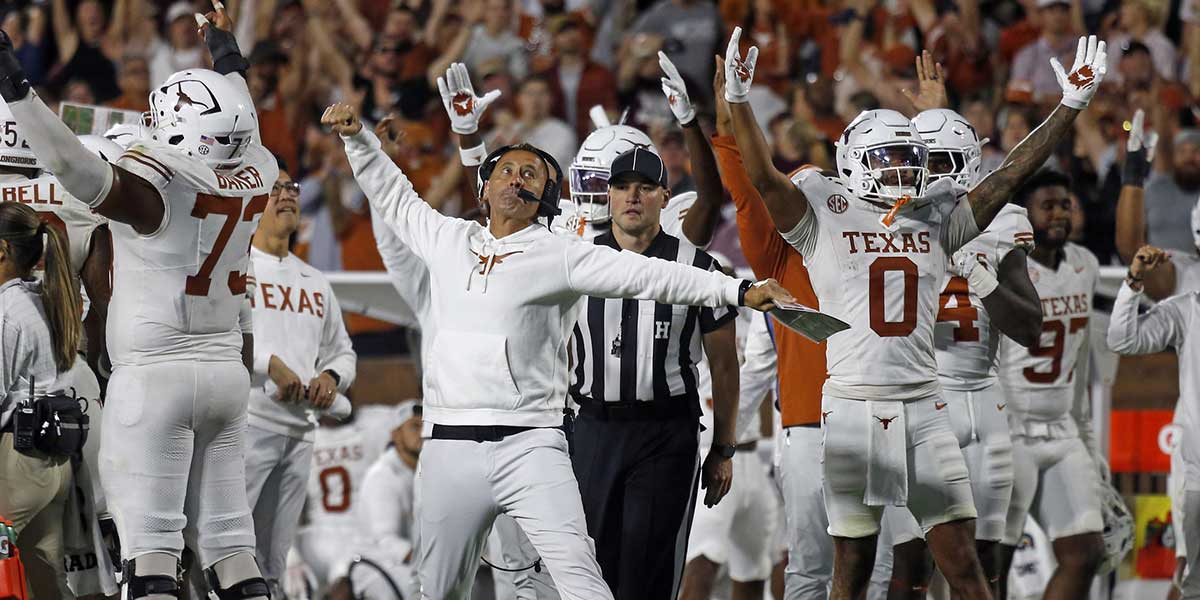 Texas Longhorns head coach Steve Sarkisian reacts after a touchdown during overtime against the Mississippi State Bulldogs at Davis Wade Stadium at Scott Field.