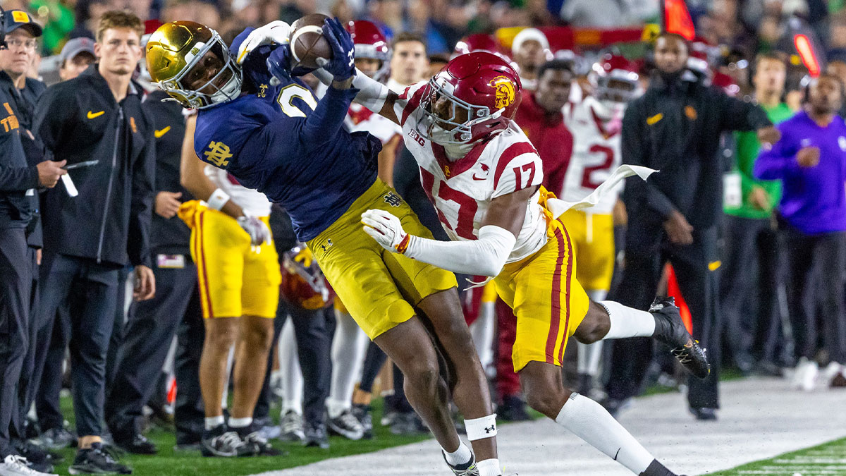 Southern California Trojans cornerback Decarlos Nicholson (17) forces Notre Dame Fighting Irish wide receiver Malachi Fields (0) out of bounds as he tries to complete a catch during the first half at Notre Dame Stadium.