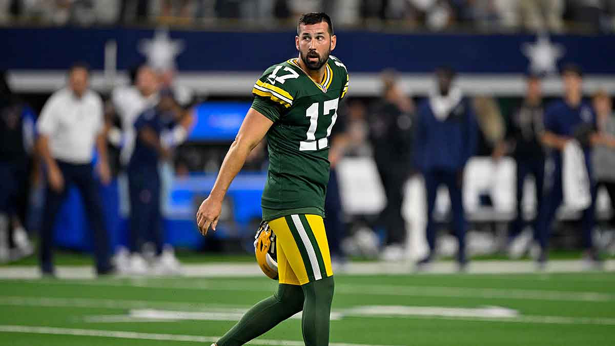 Green Bay Packers place kicker Brandon McManus (17) walks off the field after he kicks the game tying field goal in overtime during the game between the Dallas Cowboys and the Green Bay Packers at AT&T Stadium.