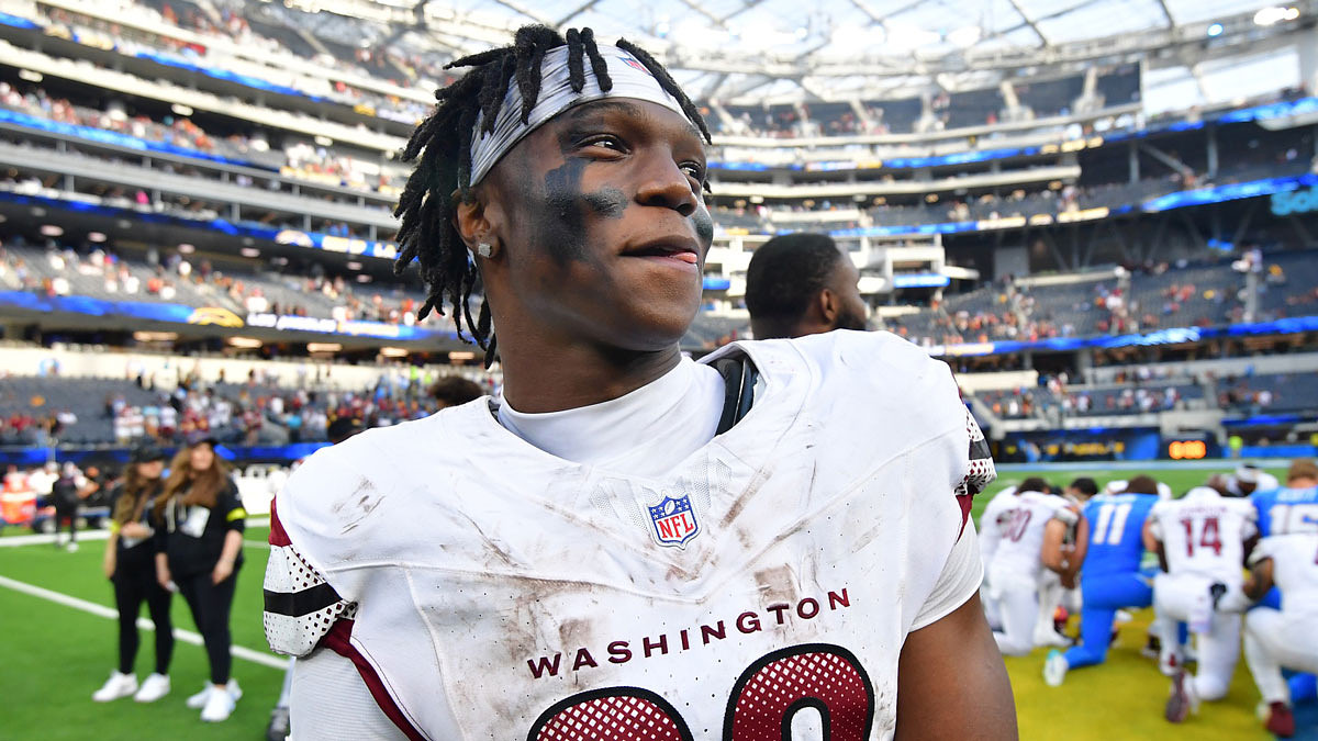 Commanders running back Jacory Croskey-Merritt (22) celebrates after the game against the Los Angeles Chargers at SoFi Stadium.