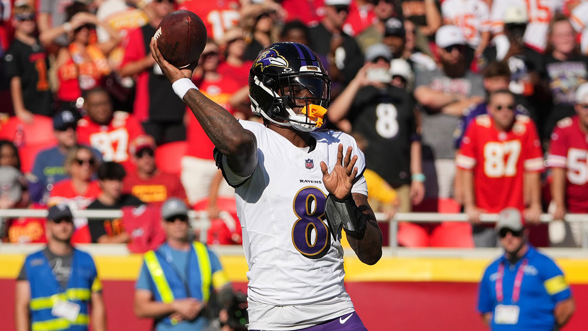 Baltimore Ravens quarterback Lamar Jackson (8) throws a pass during the second quarter against the Kansas City Chiefs at GEHA Field at Arrowhead Stadium.