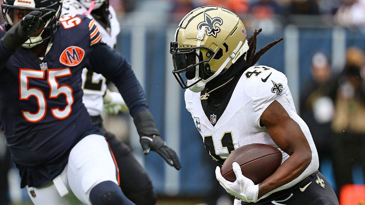 New Orleans Saints running back Alvin Kamara (41) rushes the ball against the Chicago Bears during the second half at Soldier Field.