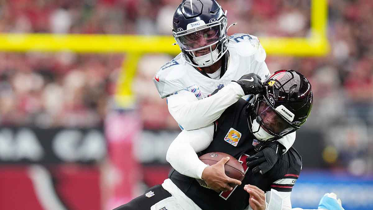 Arizona Cardinals quarterback Kyler Murray (1) is tackled by Tennessee Titans safety Amani Hooker (37) at State Farm Stadium in Glendale on Oct. 5, 2025.