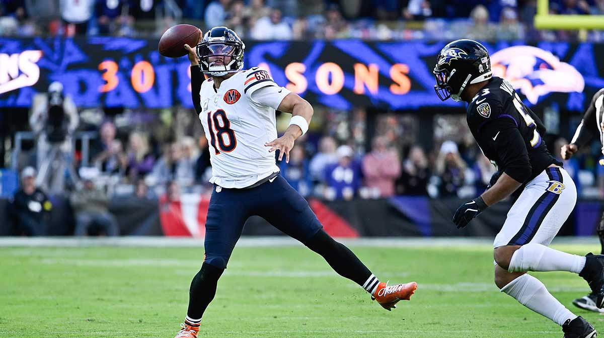 Chicago Bears quarterback Caleb Williams (18) throws a pass as Baltimore Ravens linebacker Kyle Van Noy (53) defends during the fourth quarter at M&T Bank Stadium.