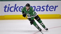 Dallas Stars left wing Jason Robertson (21) skates against the Washington Capitals during the game between the Stars and the Capitals at the American Airlines Center