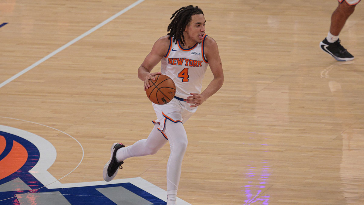 Oct 13, 2025; New York, New York, USA; New York Knicks forward Pacome Dadiet (4) dribbles up court against the Washington Wizards during the first quarter at Madison Square Garden. Mandatory Credit: Vincent Carchietta-Imagn Images