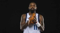 Dallas Mavericks guard Kyrie Irving (11) poses for a photo during the Mavericks 2025 media day at the American Airlines Center.
