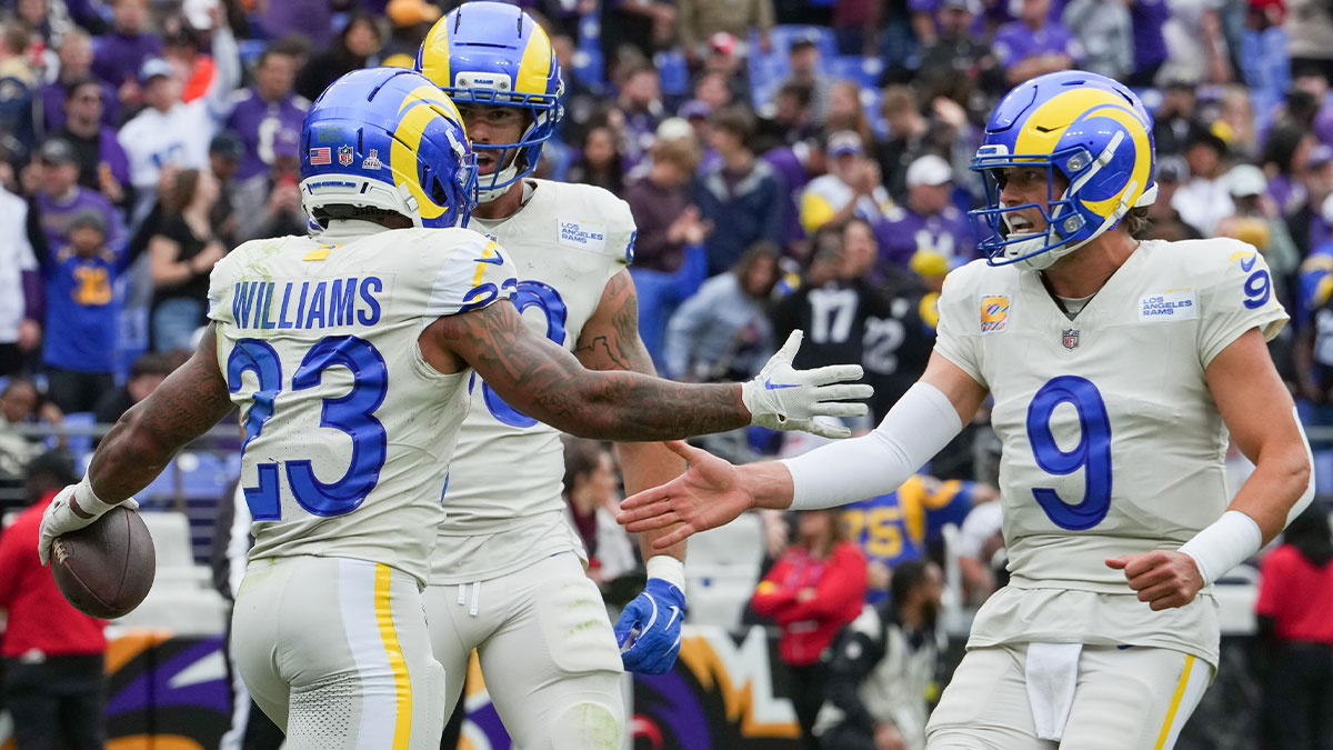 Los Angeles Rams running back Kyren Williams (23), tight end Tyler Higbee (89) and quarterback Matthew Stafford (9) celebrate after scoring a touchdown against the Baltimore Ravens during the third quarter of the game at M&T Bank Stadium.
