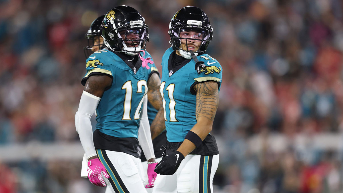 Jacksonville Jaguars wide receiver Parker Washington (11) celebrates with wide receiver Travis Hunter (12) after a touchdown during the first half against the Kansas City Chiefs at EverBank Stadium.