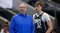 Dallas Mavericks head coach Jason Kidd and forward Cooper Flagg (32) look on during the second quarter against the LA Clippers in an NBA Cup game at the American Airlines Center.