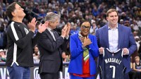 Mark Cuban and new Dallas Mavericks CEO Rick Welts and retiring Mavericks CEO Cynt Marshall and Mavericks governor Patrick Dumont present Marshall with a commerative jersey during the game between the Dallas Mavericks and the Minnesota Timberwolves at the American Airlines Center.