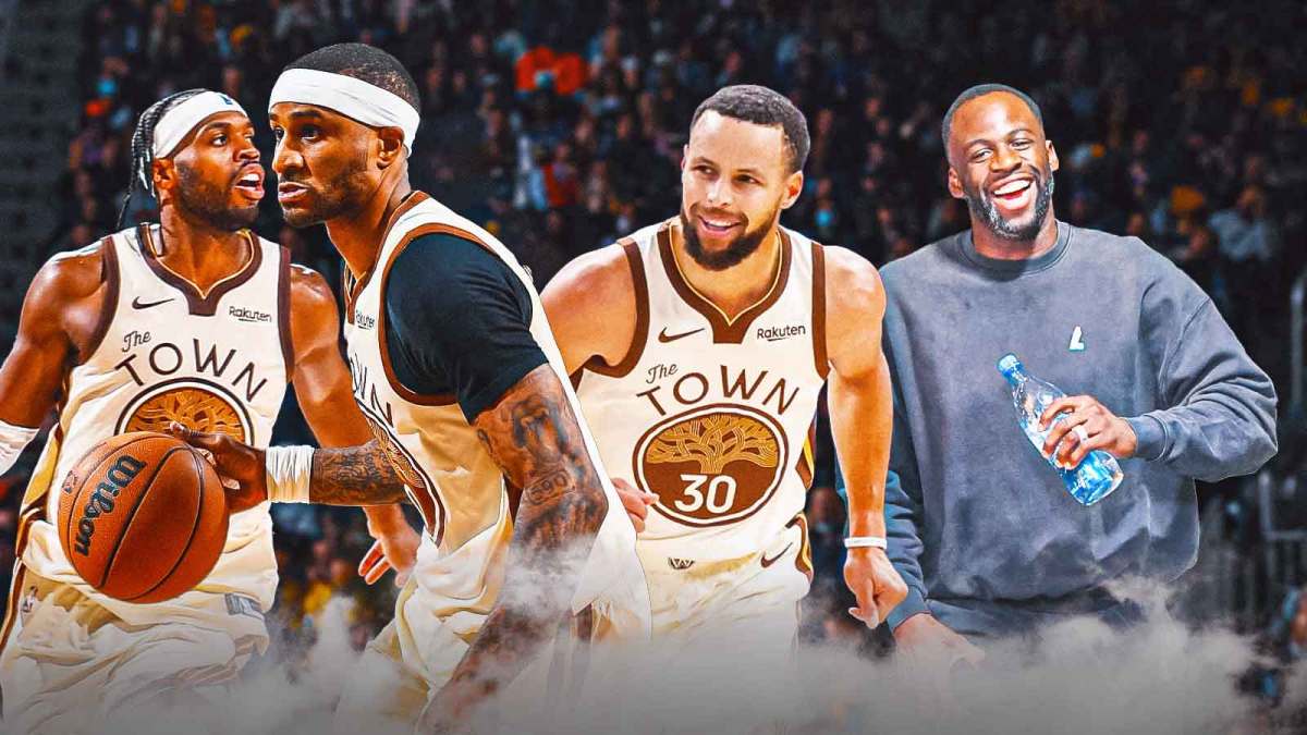 Warriors' Draymond Green in street clothes cheering on Steph Curry, GP2 and Buddy Hield