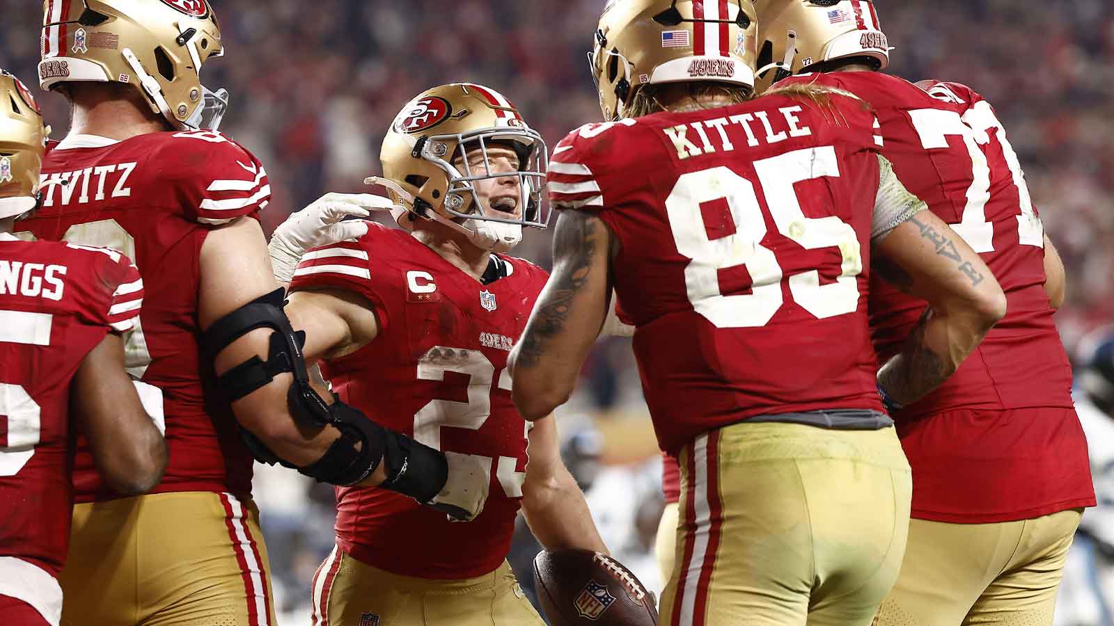 San Francisco 49ers running back Christian McCaffrey (23) reacts after scoring a touchdown against the Carolina Panthers during the second half at Levi's Stadium.
