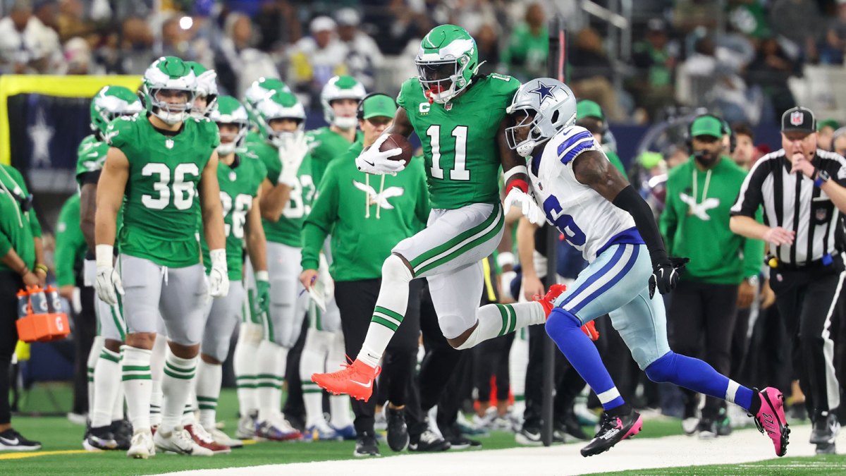 Philadelphia Eagles wide receiver AJ. Brown (11) runs with the ball in the fourth quarter against the Dallas Cowboys at AT&T Stadium.