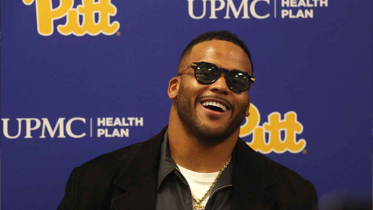 Former Pittsburgh Panthers defensive end Aaron Donald speaks at a news conference before having his number 97 jersey retired by the University at halftime of the game against the Notre Dame Fighting Irish at Acrisure Stadium.