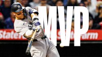 IMAGE: Yankees' Aaron Judge swinging a bat with "MVP" text in the image