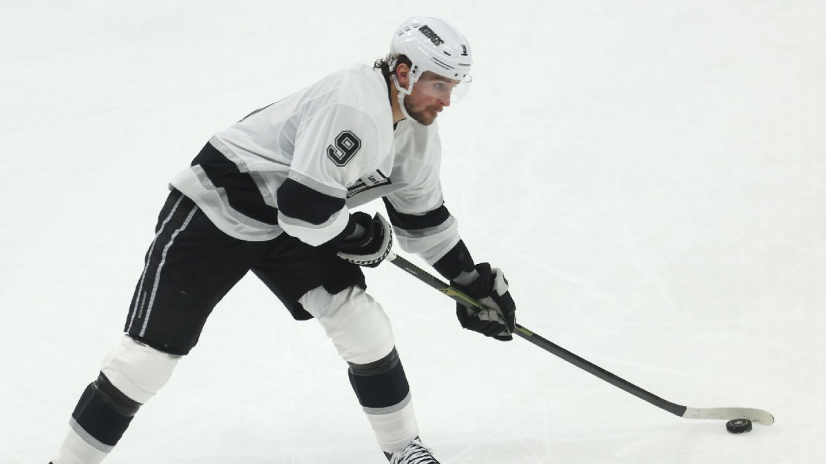 Los Angeles Kings right wing Adrian Kempe (9) shoots the puck against the Pittsburgh Penguins during the third period at PPG Paints Arena.