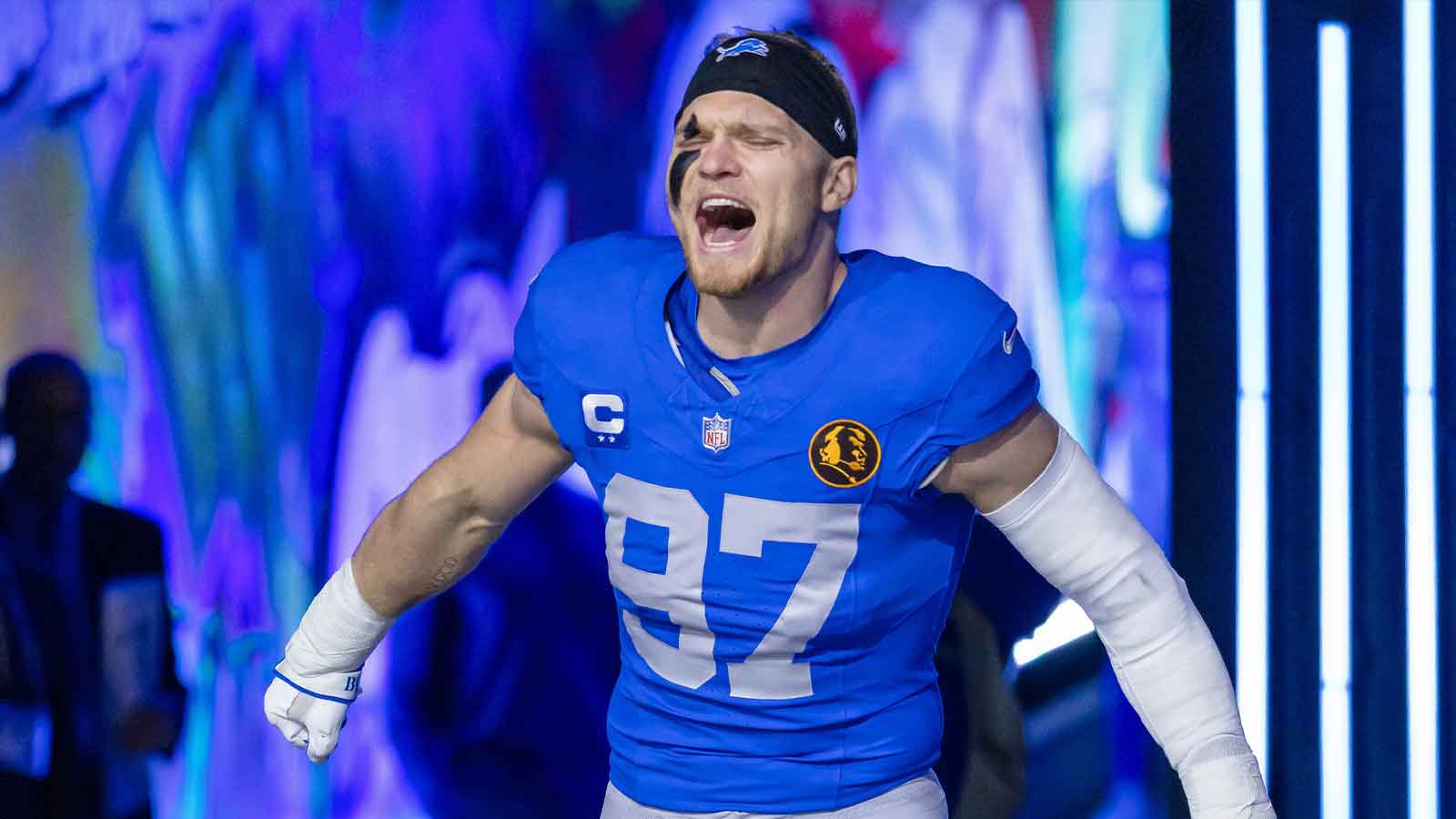Detroit Lions defensive end Aidan Hutchinson (97) runs onto the field prior to the game against the Green Bay Packers at Ford Field. 