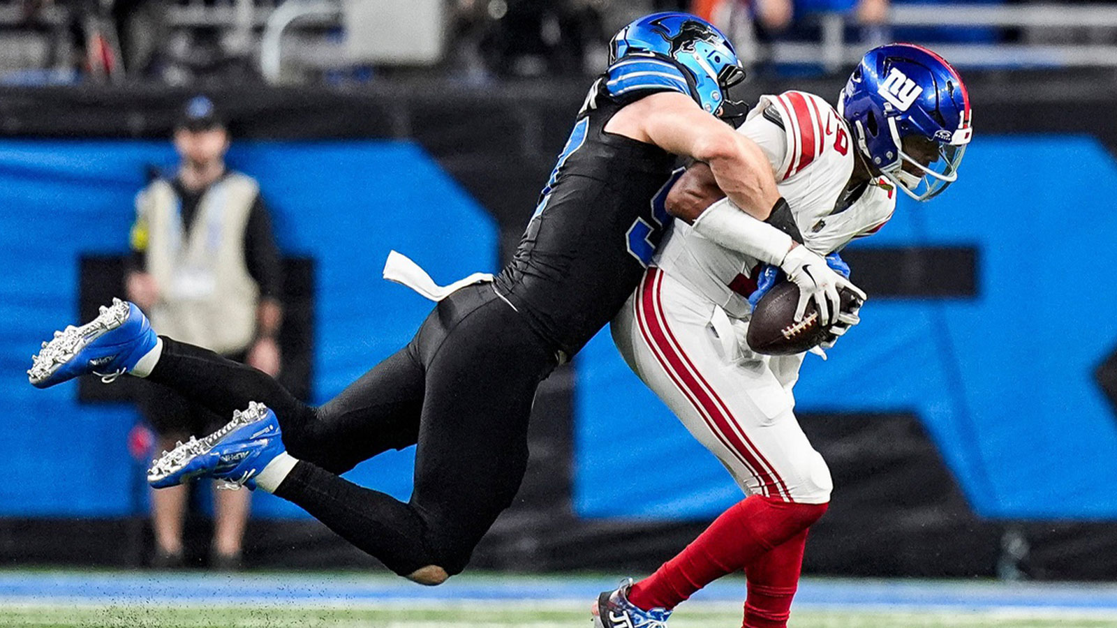 Detroit Lions defensive end Aidan Hutchinson (97) sacked New York Giants quarterback Jameis Winston (19) during the overtime at Ford Field in Detroit on Sunday, Nov. 23, 2025.