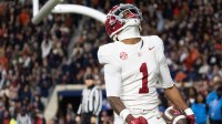 Alabama wide receiver Isaiah Horton (1) celebrates after catching his third touchdown pass of the game, giving Alabama a 27-20 lead at Jordan-Hare Stadium.