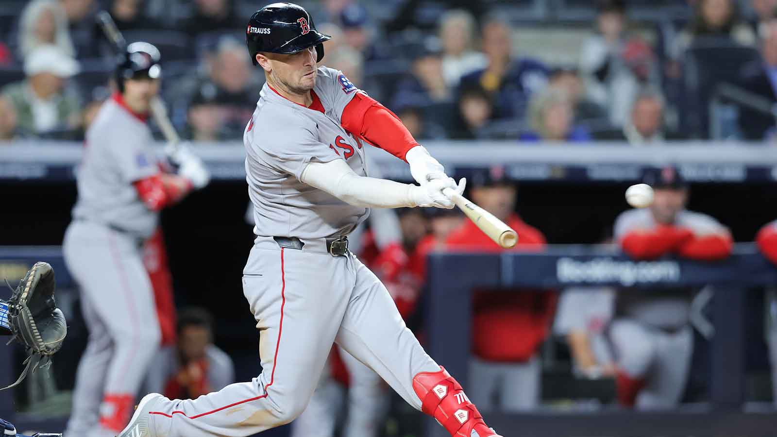 Boston Red Sox third baseman Alex Bregman (2) hits a single during the eighth inning against the New York Yankees during game two of the Wildcard round for the 2025 MLB playoffs at Yankee Stadium.
