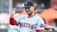 Boston Red Sox third baseman Alex Bregman (2) gestures on the field before the game between the Baltimore Orioles and the Boston Red Sox at Oriole Park at Camden Yards
