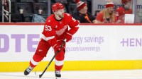 Detroit Red Wings right wing Alex Debrincat (93) skates with the puck in the third period against the New York Islanders at Little Caesars Arena.
