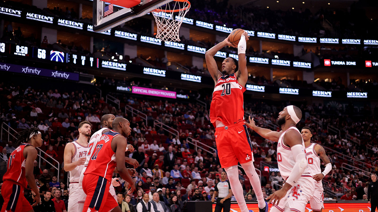 Washington Wizards center Alex Sarr (20) dunks against the Houston Rockets during the third quarter at Toyota Center. 