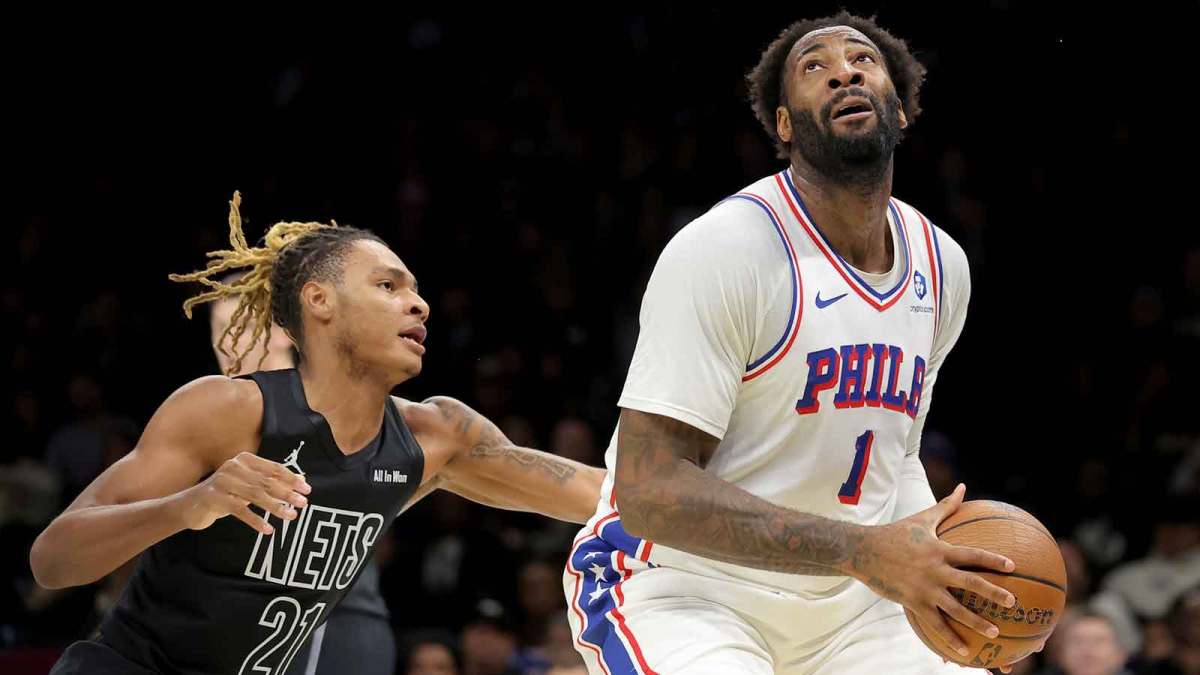 Philadelphia 76ers center Andre Drummond (1) drives to the basket against Brooklyn Nets forward Noah Clowney (21) during the first quarter at Barclays Center. Mandatory Credit: Brad Penner-Imagn Images