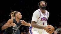 Philadelphia 76ers center Andre Drummond (1) drives to the basket against Brooklyn Nets forward Noah Clowney (21) during the first quarter at Barclays Center. Mandatory Credit: Brad Penner-Imagn Images