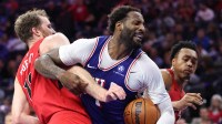 Philadelphia 76ers center Andre Drummond (1) grabs a rebound against Toronto Raptors center Jakob Poeltl (19) during the fourth quarter at Xfinity Mobile Arena.